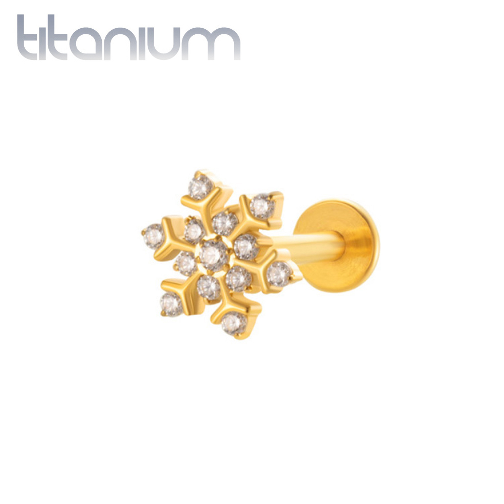 עגיל הליקס / קונץ' / פלאט מטיטניום וציפוי זהב - פתית שלג עם קריסטלים לבנים